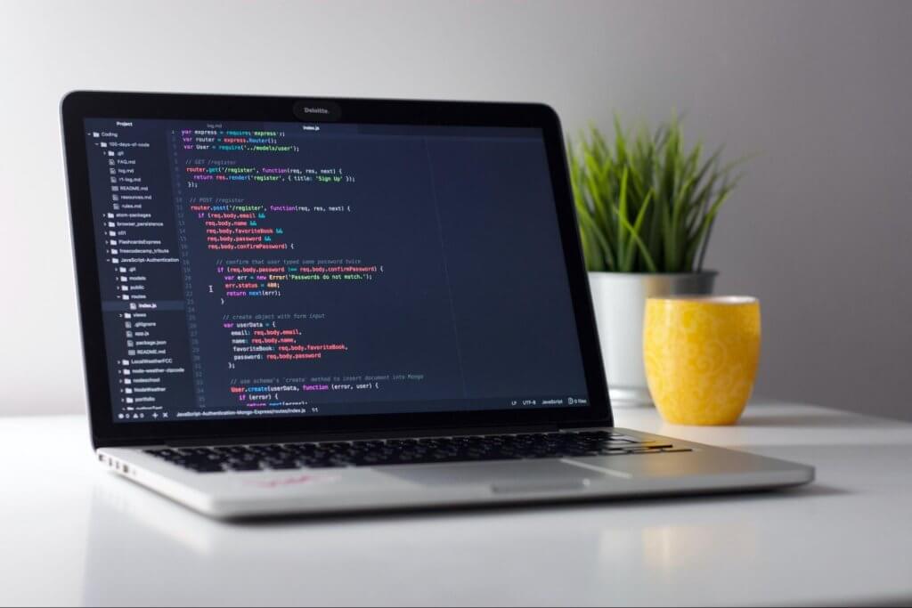 Computer open to a website coding page | 10 Most Important Pages On Your Site For SEO