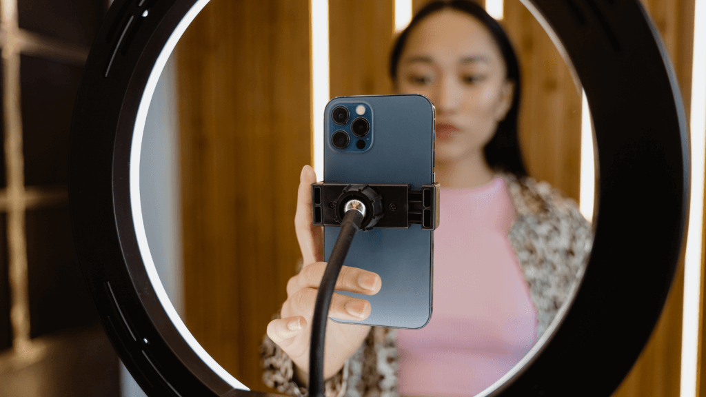 Girl filming a TikTok video
